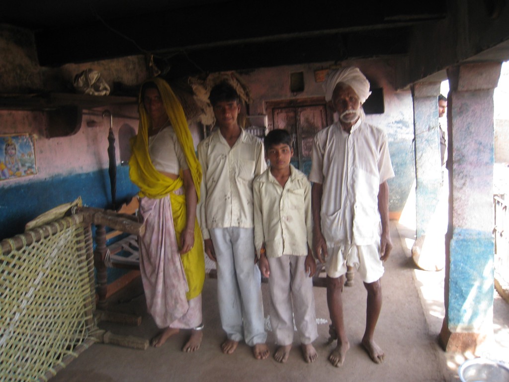 Kawar Lal with his wife and grandchildren