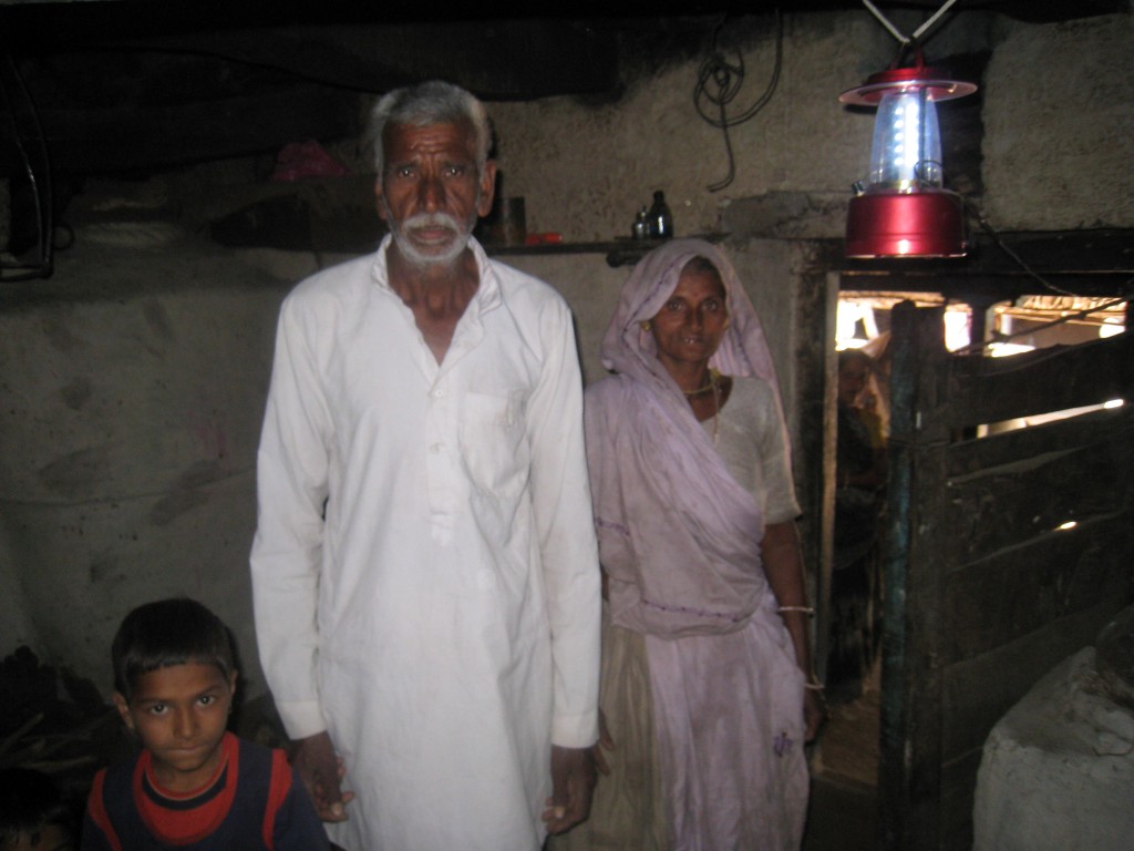 Manohar Singh with his wife and grandson