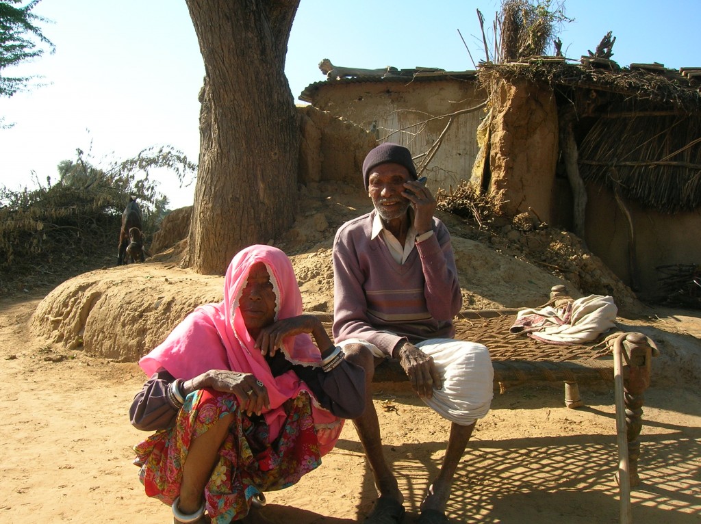 Chittar Singh and his wife with their new mobile phone