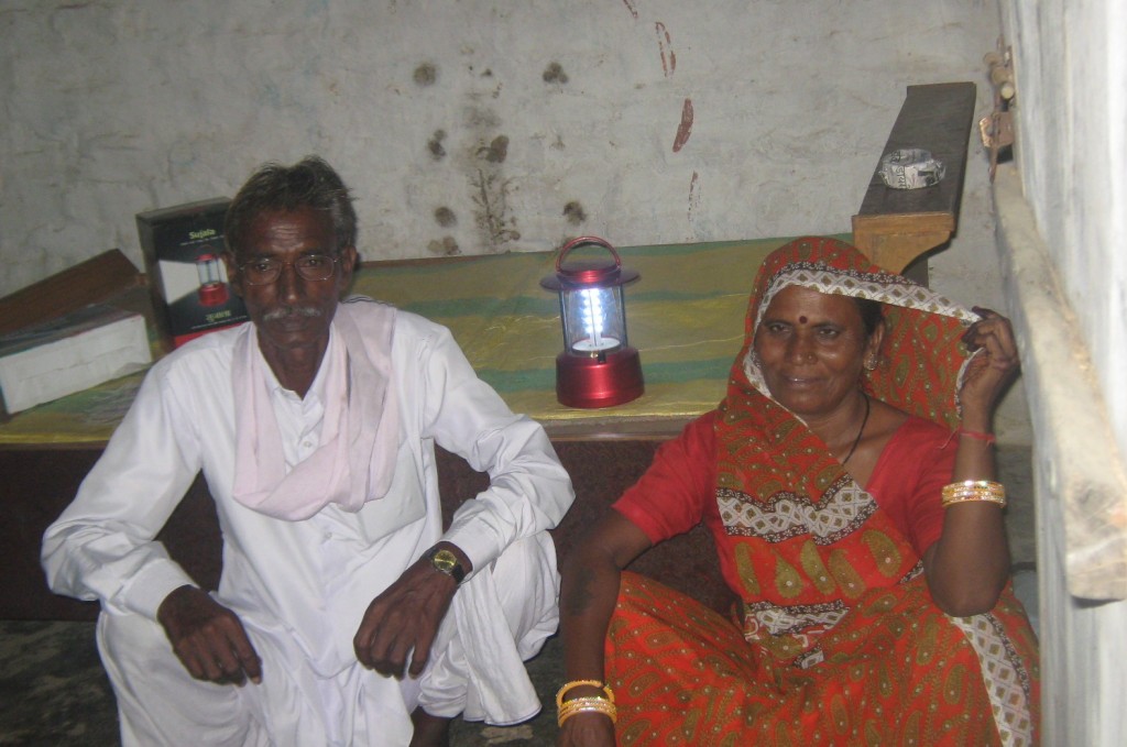 Prabhu Dayal and his wife with the new solar lantern